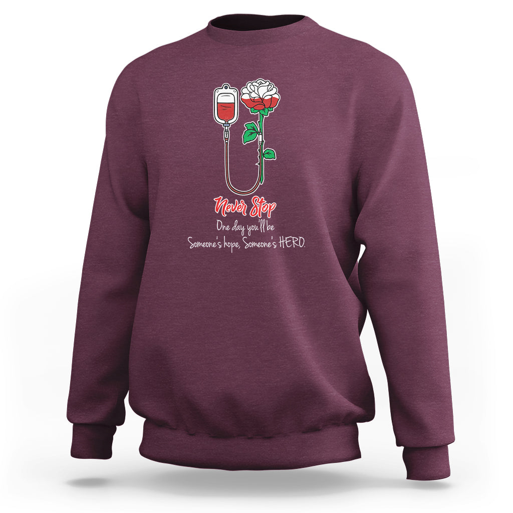 Maroon nurse sweatshirt with front floral hope graphic and red text