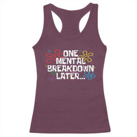Maroon racerback tank top with colorful 'One Mental Breakdown Later' graphic