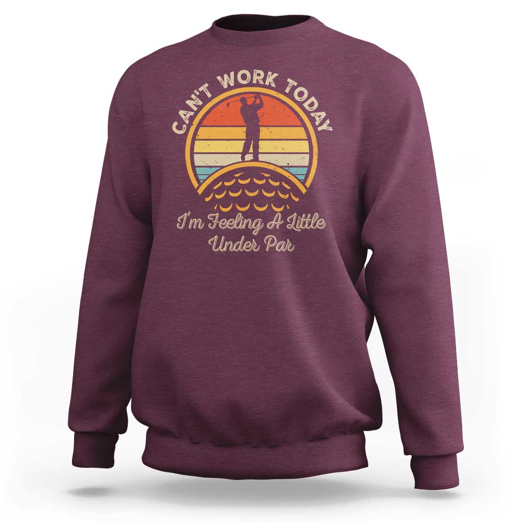 Maroon golf sweatshirt with circular golf-themed graphic and slogan on front