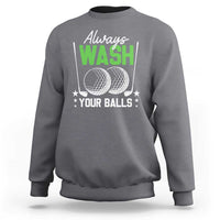 Charcoal gray crewneck sweatshirt with "Always WASH Your Balls" golf ball graphic on chest