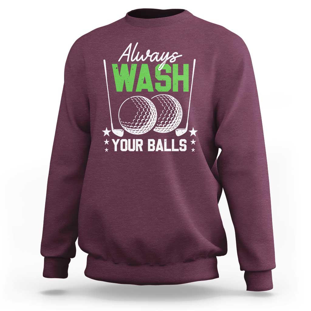 Maroon crewneck sweatshirt with "Always WASH Your Balls" golf ball graphic on chest