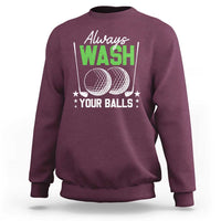 Maroon crewneck sweatshirt with "Always WASH Your Balls" golf ball graphic on chest