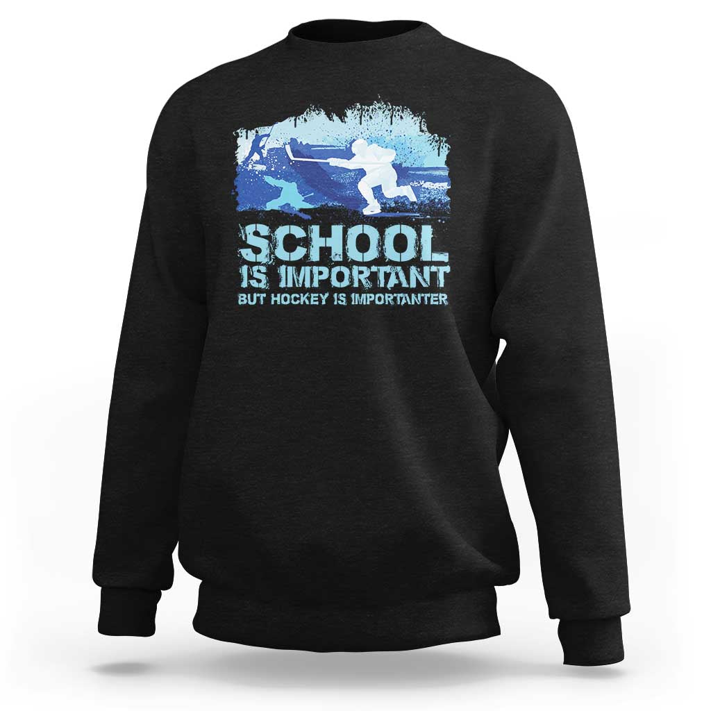 Black crewneck sweatshirt with blue hockey graphic and “School is Important” text.