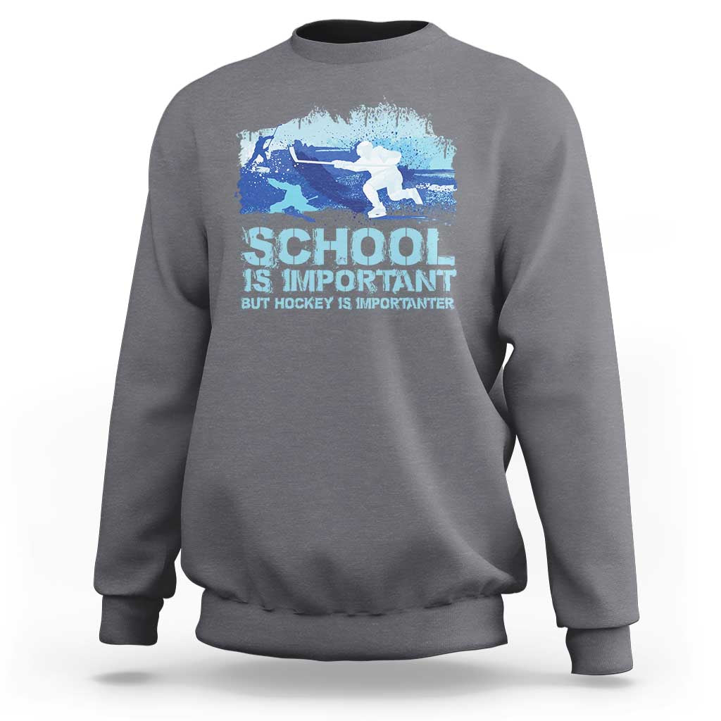 Gray crewneck sweatshirt with blue hockey graphic and “School is Important” text.