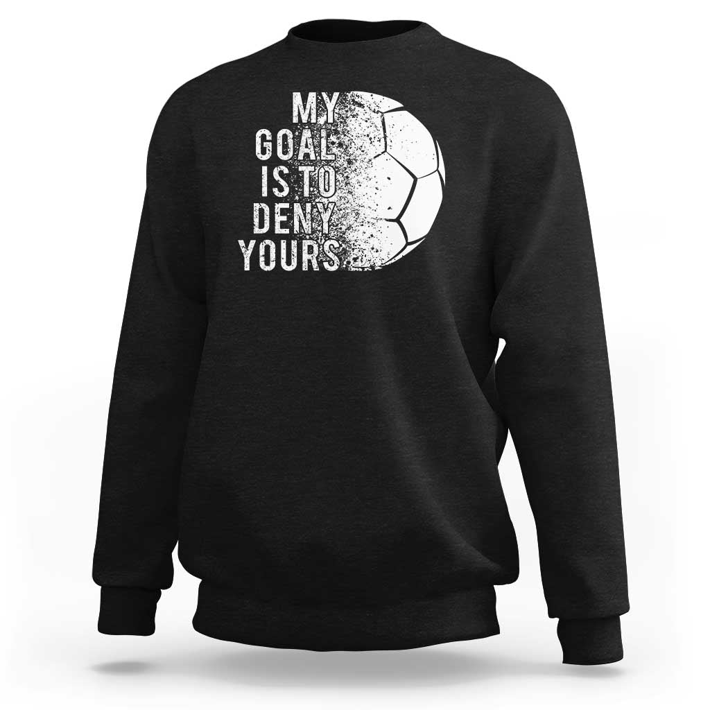 Black goalkeeper sweatshirt with “My goal is to deny yours” text and soccer ball graphic