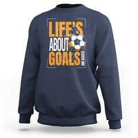 Navy soccer sweatshirt with Life's About Goals graphic and soccer ball on front