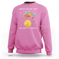 Pink crewneck sweatshirt with space planets illustration and 'Back in My Day' text.