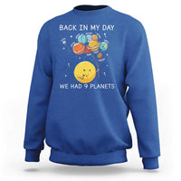 Blue crewneck sweatshirt with space planets illustration and 'Back in My Day' wording.