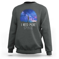 Charcoal astronomy sweatshirt with galaxy graphic, figure silhouette, 'I NEED MORE SPACE'