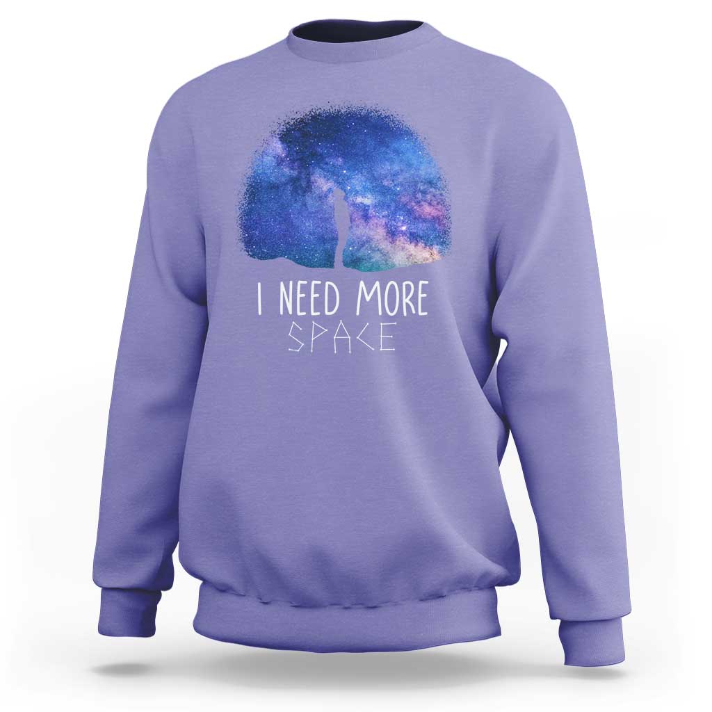 Lavender astronomy sweatshirt with galaxy dome graphic and 'I NEED MORE SPACE' text