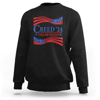 Black crewneck sweatshirt with patriotic “Creed '24” graphic and wavy flag print