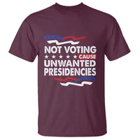 Maroon crew-neck T-shirt with “NOT VOTING CAUSE UNWANTED PRESIDENCIES” graphic