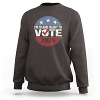 Dark brown crewneck sweatshirt with “I’m 18 and Ready to Vote 2024” front graphic