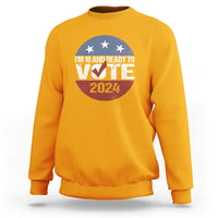 Gold crewneck sweatshirt with “I’m 18 and Ready to Vote 2024” front graphic