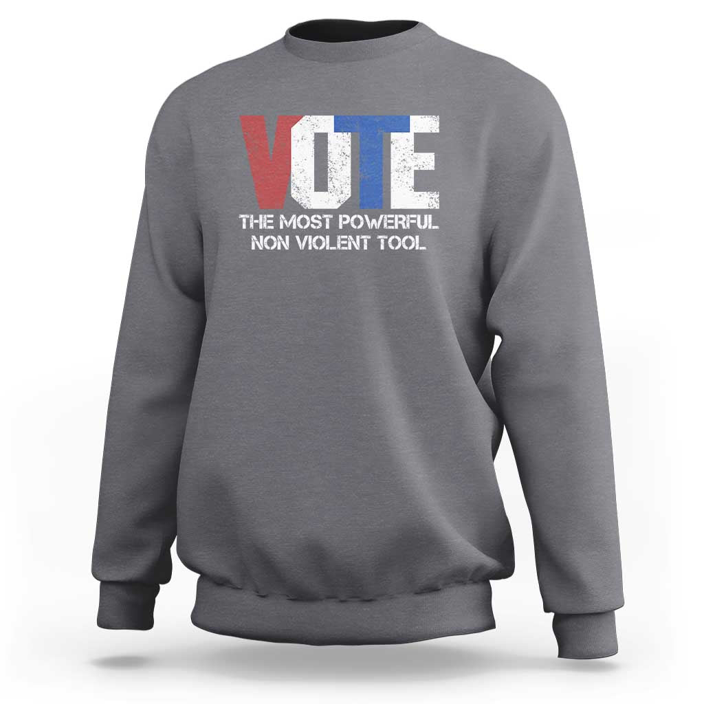 Charcoal gray crewneck sweatshirt with VOTE graphic and “NON VIOLENT TOOL” text