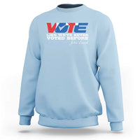 Light blue crewneck sweatshirt with “VOTE” graphic and “Voted Before” text