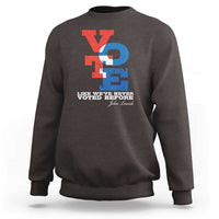 Dark brown crewneck sweatshirt with "Like we've never voted before" printed graphic