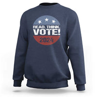 Navy sweatshirt with “READ. THINK. VOTE!” graphic featuring stars and “2024”