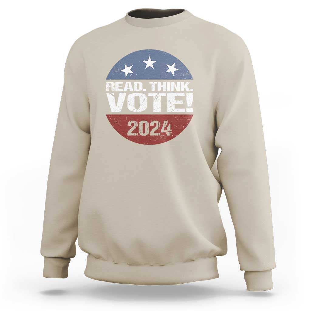 Sand-colored sweatshirt with “READ. THINK. VOTE!” stars and “2024” graphic