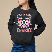 Black sweatshirt with colorful snake-heart graphic on front
