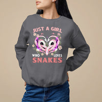 Charcoal sweatshirt with colorful snake-heart graphic on front