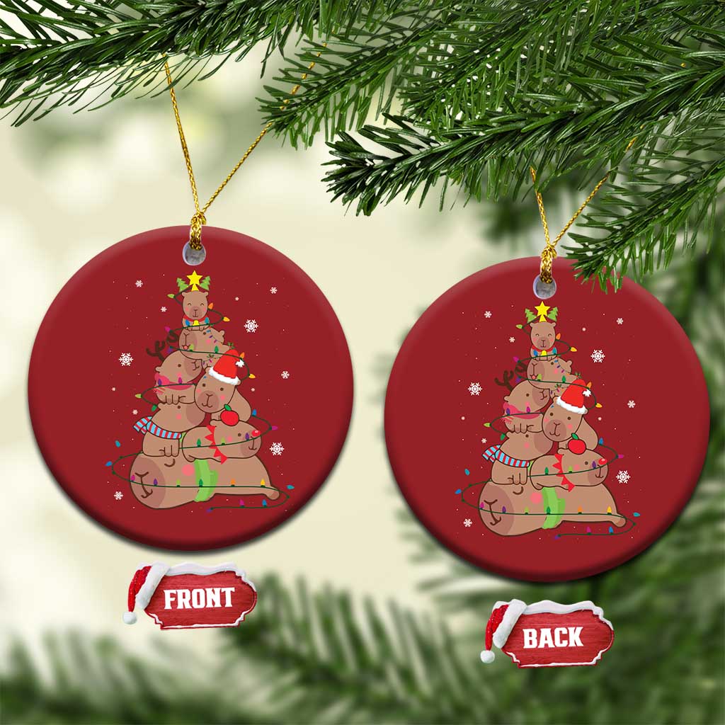Red round ornament set with capybara and nutcracker graphic, front and back tags