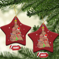 Red star ornament with capybara and nutcracker graphic, hanging gold loop, front/back tags