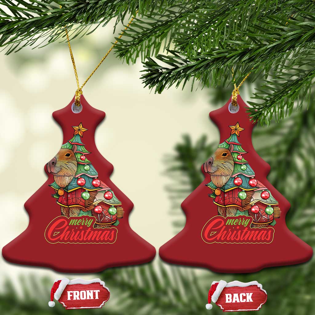 Pair of red Christmas tree-shaped capybara ornaments with Merry Christmas text and gold cords