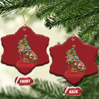 Pair of red bell-shaped capybara Christmas ornaments with Merry Christmas text and gold cords
