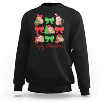 Black crewneck sweatshirt with capybara Christmas graphic and red bows