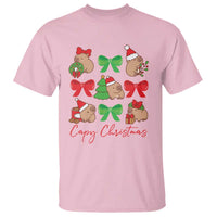 Light pink capybara Christmas T-shirt with colorful bow wreath print and 'Capy Christmas' text