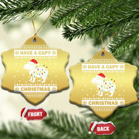 Gold snowflake-shaped capybara Christmas ornament with “HAVE A CAPY” and “CHRISTMAS”