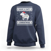 Navy Christmas sweatshirt with capybara graphic and 'Have a Capy Christmas' text.