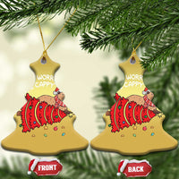 Two gold bell ornaments with capybara artwork and 'WORRY CAPPY' reverse text, front/back tags