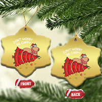 Two gold snowflake-shaped capybara ornaments with 'DON'T WORRY BE CAPPY' text and front/back tags