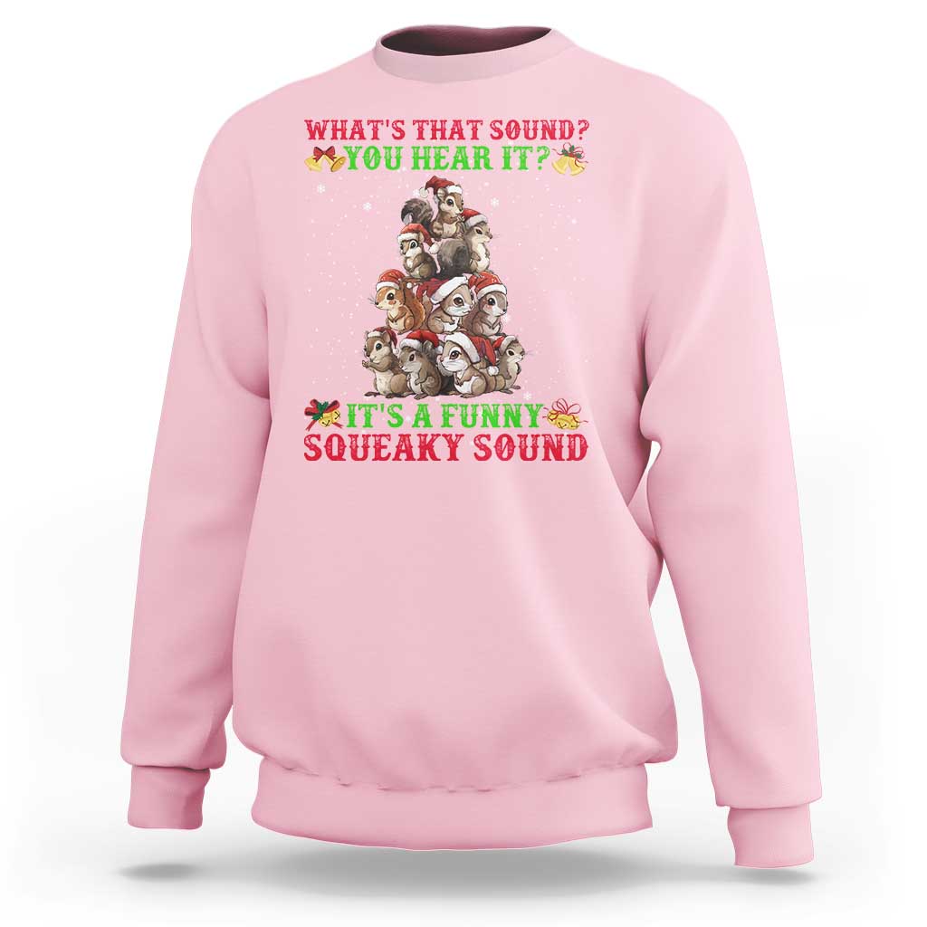 Light pink crewneck sweatshirt with front squirrel Christmas graphic