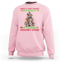 Light pink crewneck sweatshirt with front squirrel Christmas graphic