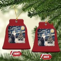 Red bell-shaped Christmas ornament with opossum in a starry night winter scene and gold loop