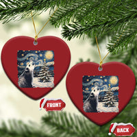 Red heart-shaped Christmas ornaments with opossum starry night winter scenes and gold loops