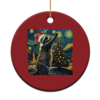 Red round raccoon Christmas ornament with colorful night scene artwork and hanging loop