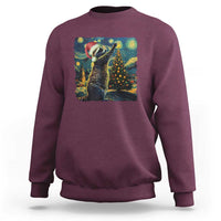 Maroon crewneck sweatshirt with colorful raccoon holiday art on the front