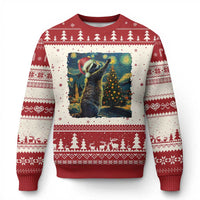 Ugly Christmas sweater with raccoon artwork, red and cream fair isle stripes.