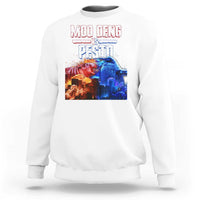 White crewneck sweatshirt with colorful “MOO DENG VS PESTO” graphic on chest