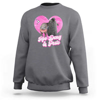 Charcoal gray graphic sweatshirt with pink heart logo and Moo Deng & Pesto text
