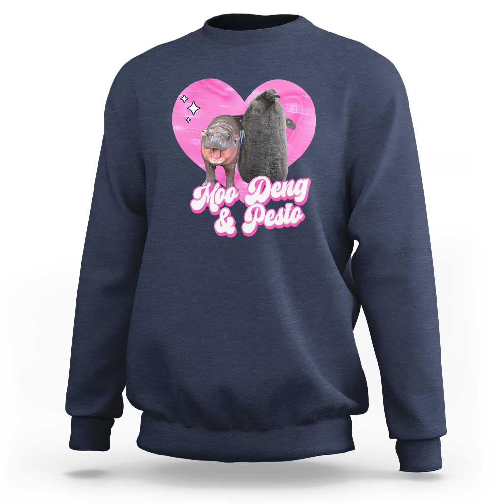 Navy graphic sweatshirt with pink heart logo and Moo Deng & Pesto lettering