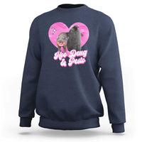 Navy graphic sweatshirt with pink heart logo and Moo Deng & Pesto lettering