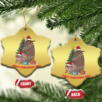 Gold star-shaped Christmas ornaments hanging, cartoon nativity animals and 'First Christmas 2024'