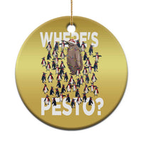 Gold circular Christmas ornament with “Where’s PESTO?” text and a cartoon scene, hanging loop.