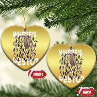 Two gold heart-shaped ornaments with “Where’s PESTO?” text and front/back labels attached.