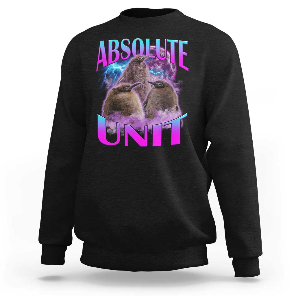 Black crewneck sweatshirt with penguin graphic and “ABSOLUTE UNIT” print on chest.